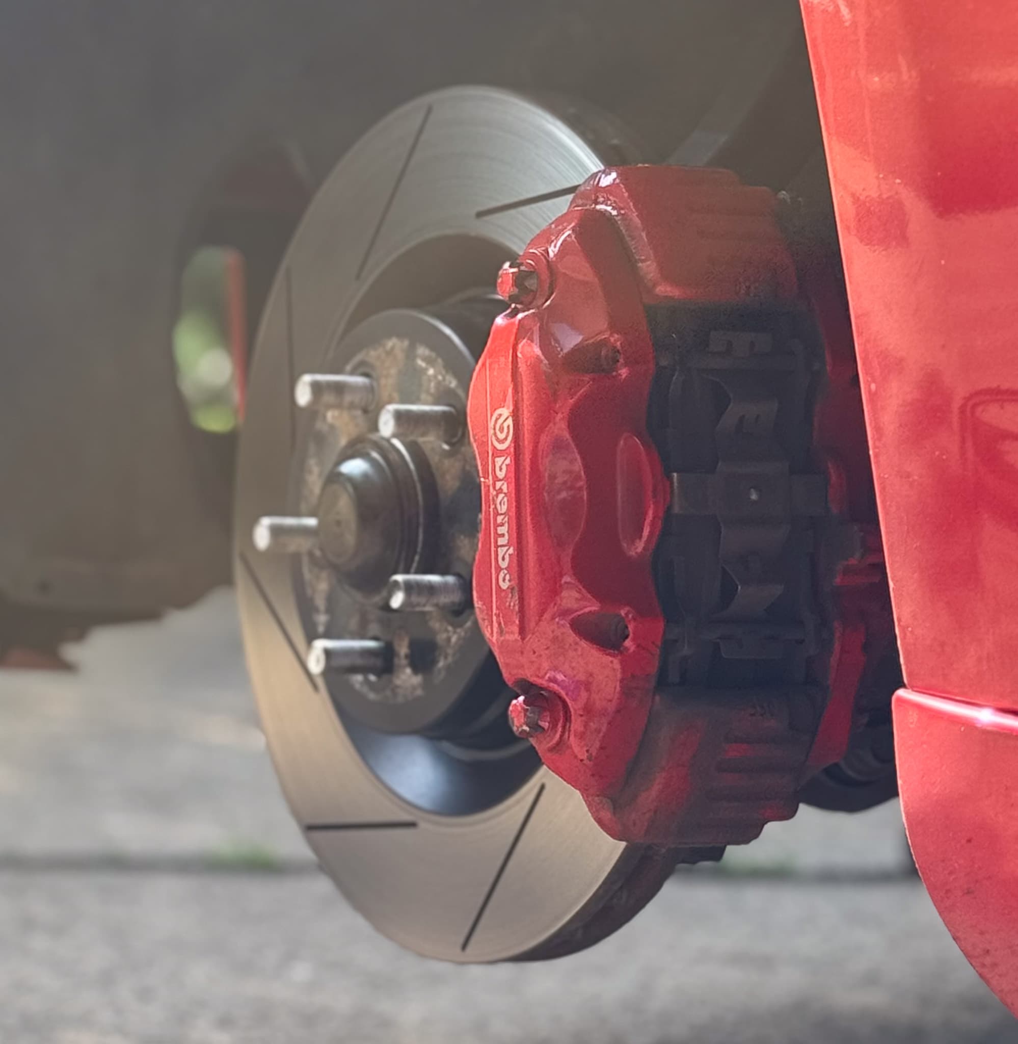 High-performance brake caliper and rotor — JG Auto Care precision work