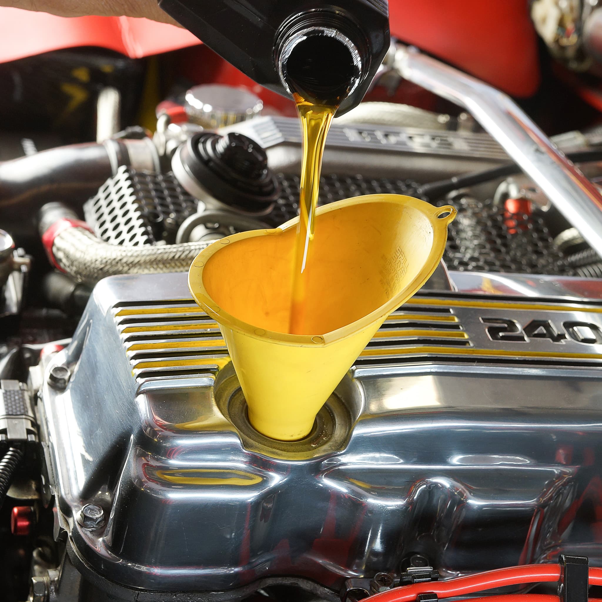 JG Auto Care mechanic performing a professional oil change